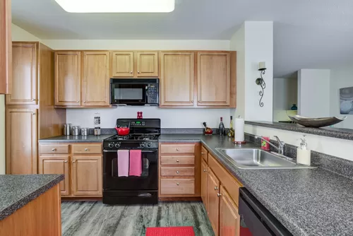 Oversized Kitchen with Ample Counter Space and Cabinet Storage - Summit Place