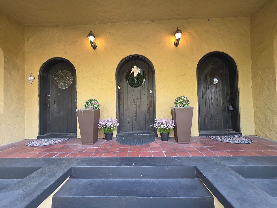 Entrance to the upstairs units is through the middle door