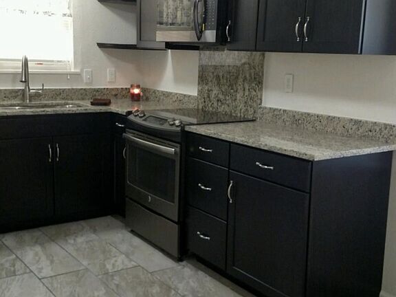 New kitchen cabinets & granite . Top of the line new stove & above range microwave!!!