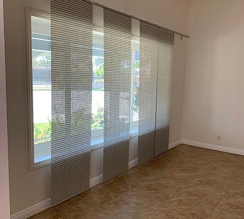 Classic window coverings allowing a balance of light and privacy.