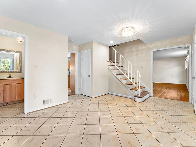 Large entry foyer with ceramic tile flooring