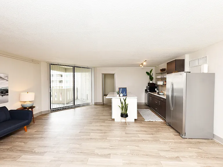 Spacious living room with hardwood-style flooring