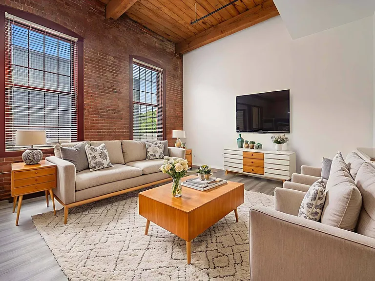 Unwind in a spacious living area designed for cozy nights and casual entertaining.