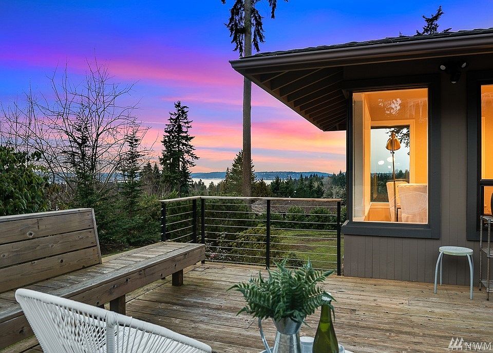 Perched above and overlooking sweeping views of Lake Washington from every single room!
