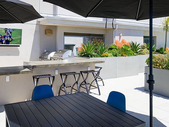 Outdoor BBQ lounge at Metwest apartments.