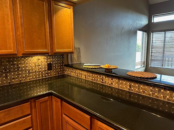 Stainless Steel Kitchen with Granite Countertops