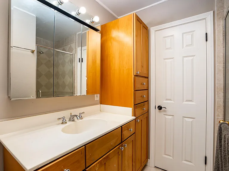 Master Bathroom with plenty of storage space Kraftmaid cabinetry.