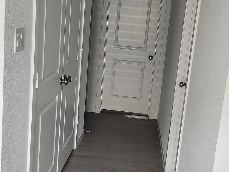 Hallway to guest rooms/ bathroom