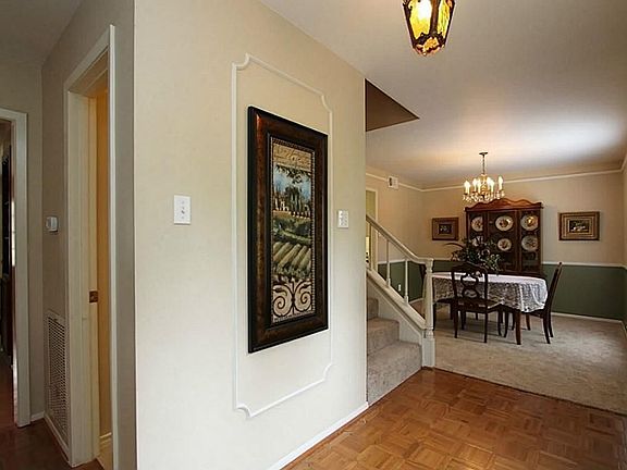 Leads to formal dining on the right