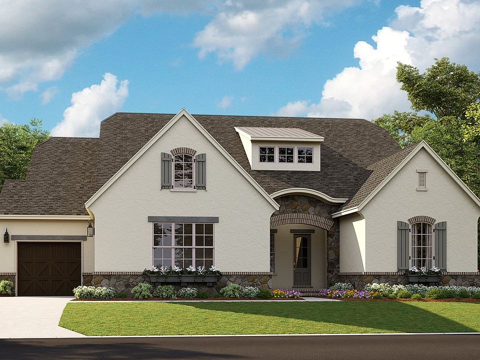 Santa Fe C- French Cottage 3-Car Side Load Garage Note Renderings may show optional features