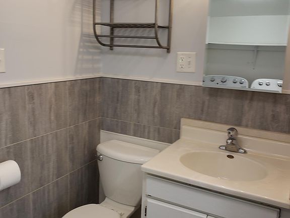 Bathroom with medicine cabinet and alot of storage