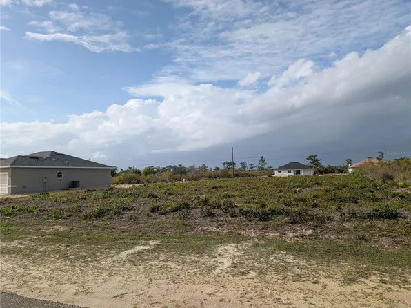 12 Poinciana Dr #6, Indian Lake Estates, FL 33855