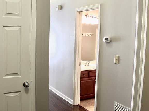 Entry way. Coat closet on the left, first bedroom and bathroom to the right.