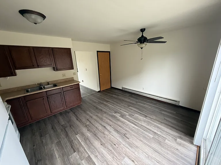 Kitchen with new flooring and under stairs storage