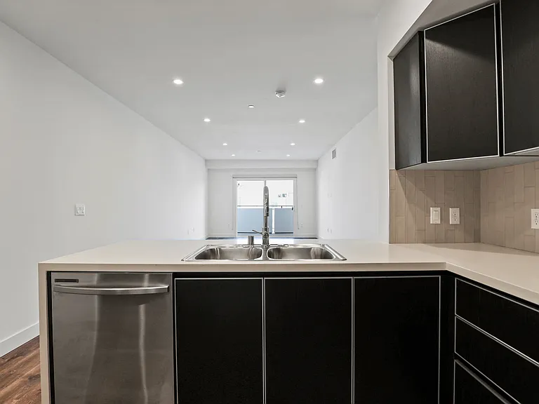 Open-Concept Kitchen, Dining, and Living Room Space
