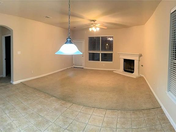 Living Room & Fireplace & Door to Primary Bedroom