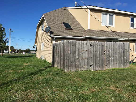 Privacy fence and shed in the back with additional parking o