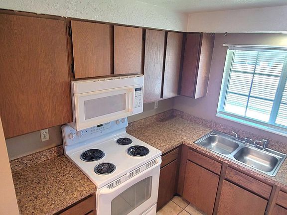 Space saving over the range microwave.