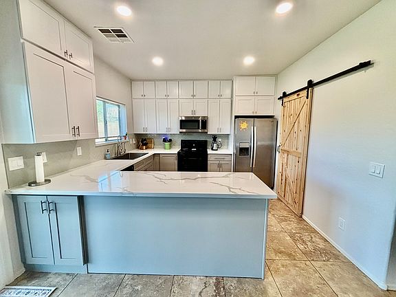 5th image of 223 E Saddle Way