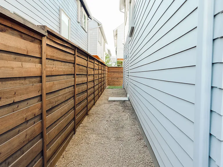 Private walkway to side yard.