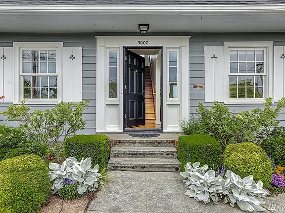 Welcome to 3007 12th Avenue South, a gardener's paradise, perfectly located in the heart of North Beacon Hill. 