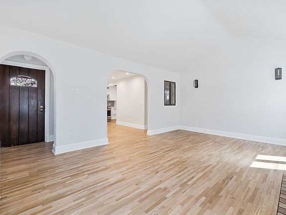 Front entrance and main Living Area. Built in 1923, this 2,688 sq ft residence offers a blend of historic character and modern convenience