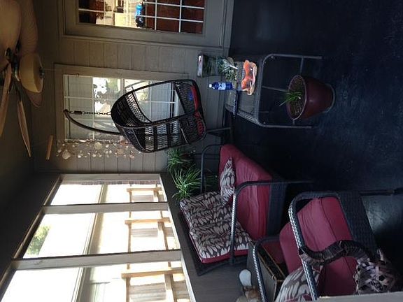 Screened in porch perfect for relaxing outdoors