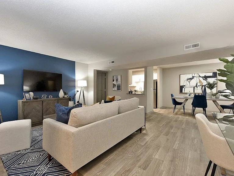 Spacious living room with hardwood-style flooring