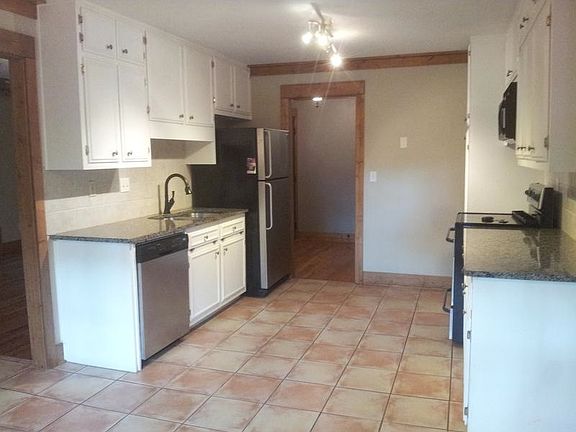 Kitchen with granite countertops and stainless steel applian