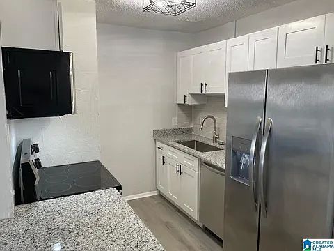 3rd image of 1302 Woodland Vlg #1302