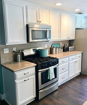 Kitchen with Stainless Steel Appliances.