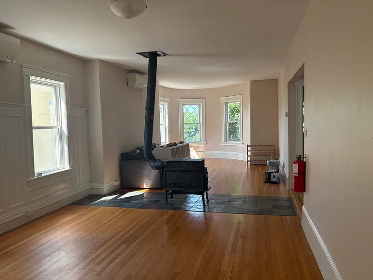 Picture of living room taken from dinning room area. Open and relaxing space with plenty of gorgeous sunlight.