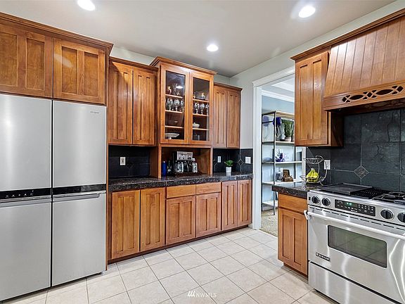 Stainless steel appliances and plenty of counter space make this kitchen a great place to create your meals.