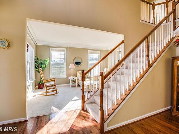 Living room off foyer perfect for entertaining