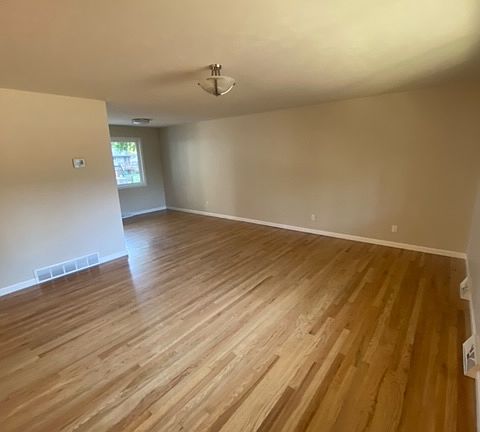 Upper Level Living area and dining area off kitchen