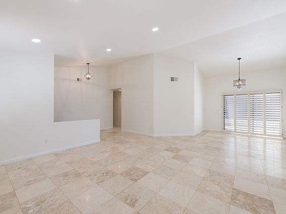 Dining room has sliding door leading to side patio and backyard