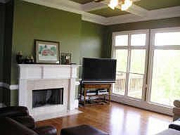 great room with coffered ceilings