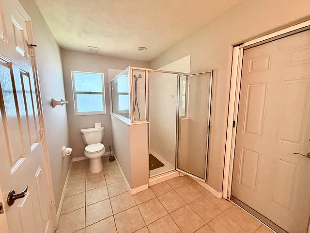Primary bath with access to back porch