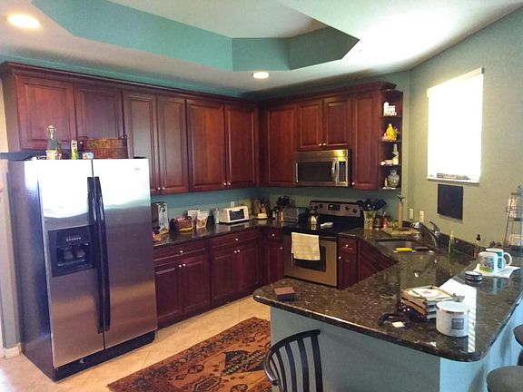 Granite countertops and cherry cabinets