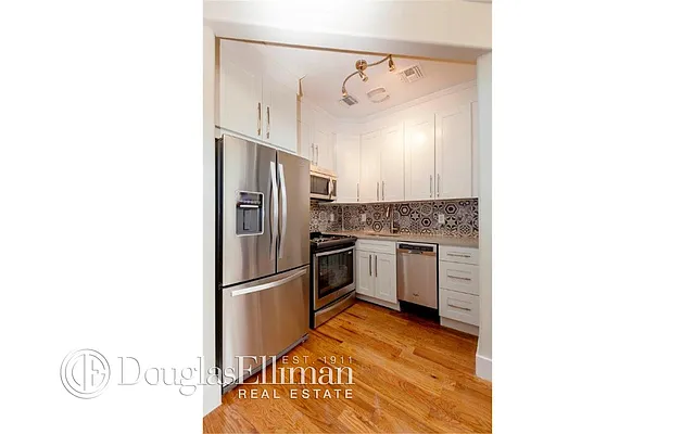 Sold by Douglas Elliman | media 11