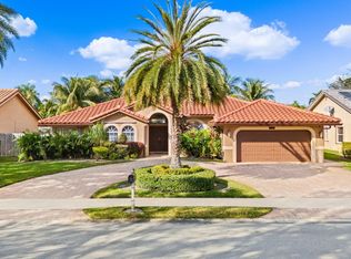 9777 N Springs Way, Coral Springs, FL 33076