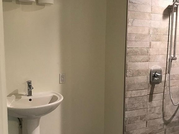 New bath with walk in shower.