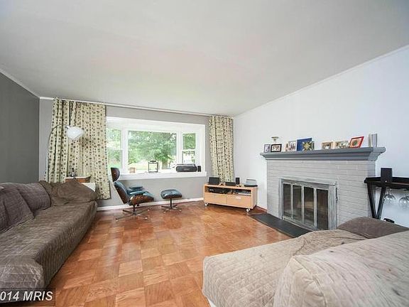 Spacious Living room with wood burning fireplace