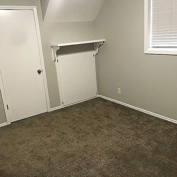 Closet and additional storage under the steps.