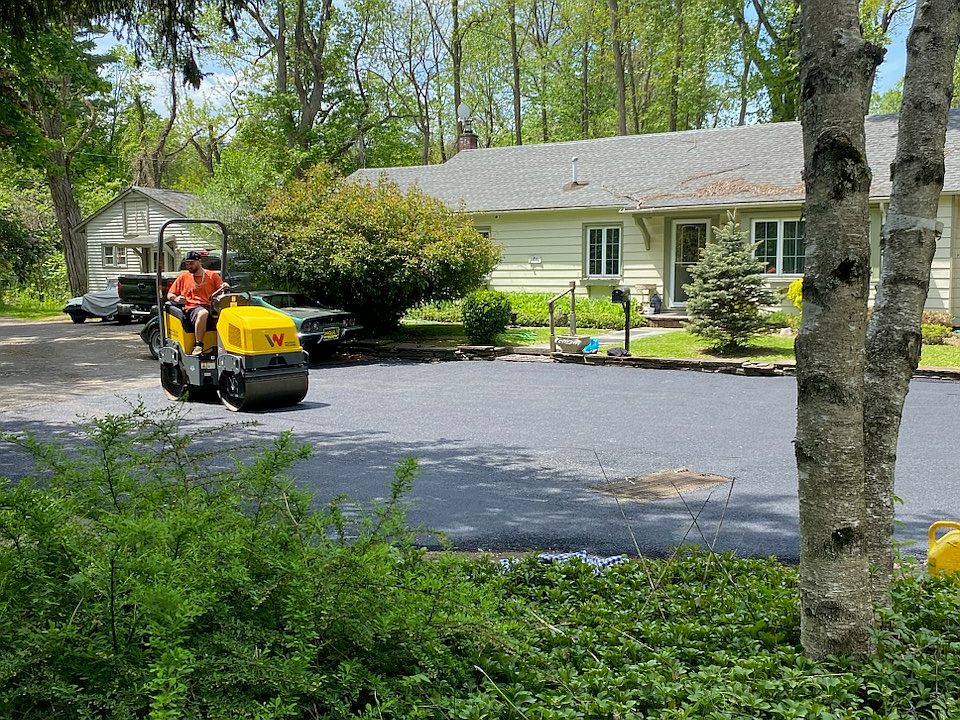 Newly paved road , private road wolven lane with two parking spaces for cottage