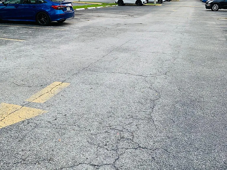 Condominium, Gated Parking Lot.