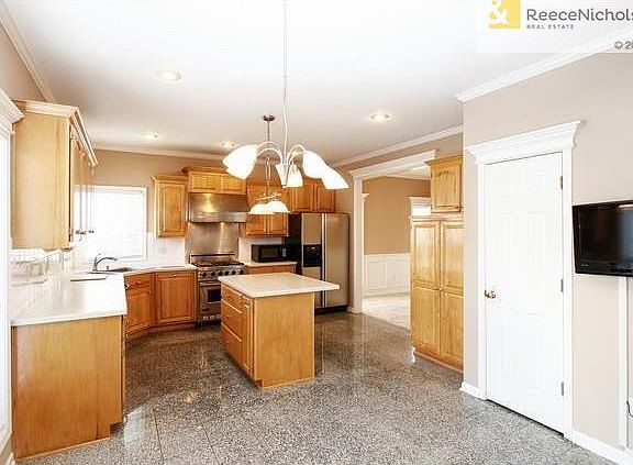 Large Great Room with fresh Paint and New Carpet. Gas Fireplace Never Used