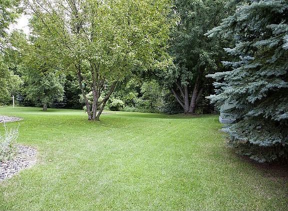 Backs up to Coon Creek. Over sized Corner Lot.