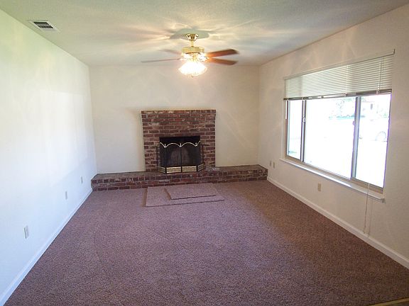 The picture window lets in natural light and faces north.