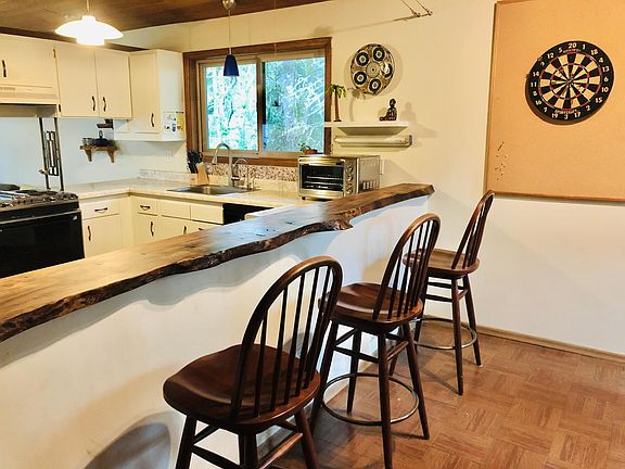 Dining bar and kitchen. Play darts!